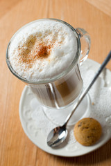 four teapots and glasses with different colors fruit tastes of tea