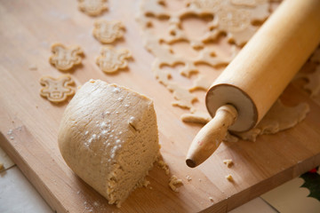 Fototapeta na wymiar Gingerbread preparations in kitchen, rolling pin and shape cutter