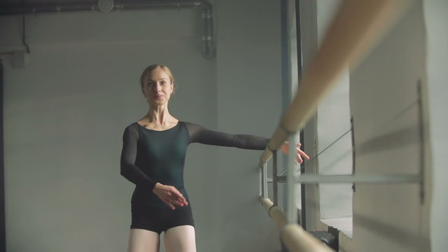 Ballerina warms up, slow motion