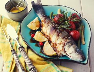 Fish baked sea bass with lemon sauce