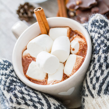 Hands In Mittens Holding Hot Chocolate