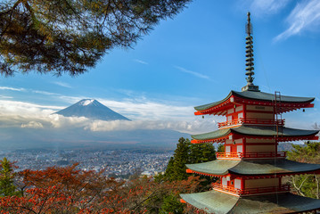Mt. Fuji viewed from behind Chureito Pagoda with fall colors in japan.