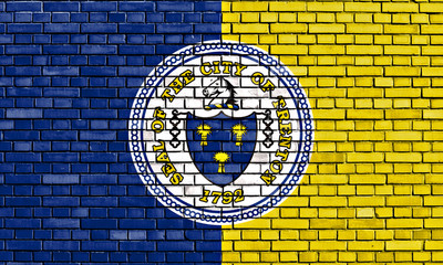 flag of Trenton painted on brick wall