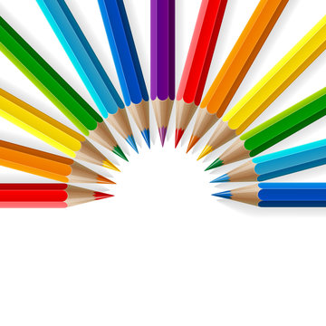 Semicircle of rainbow colored pencils with realistic shadows on white background
