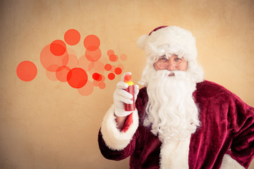 Santa Claus making a graffiti