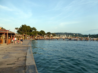Fototapeta premium Tourists on the Adriatic seashore in Lucija, Slovenia