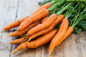 Fotobehang fresh carrots bunch © Gresei