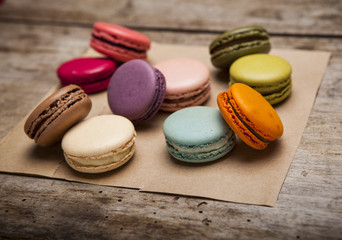 Colorful French Macaroons On Wooden background