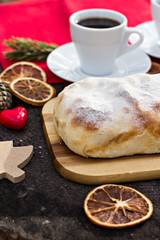Strudel with custard and orange. Christmas Stollen. Christmas table decoration.