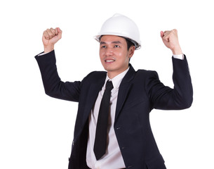 Happy young engineer celebrating with arm raised, concept of suc