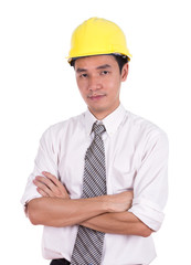 engineer in yellow helmet with arms crossed