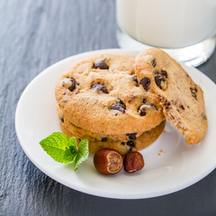 Chocolate chip cookies on white plate