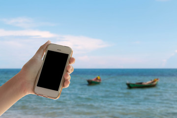 Woman hand with smartphone