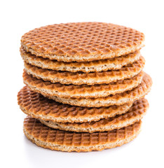 Waffles filled with honey (isolated on white)