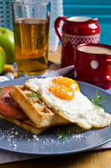 Waffles with sausage and eggs