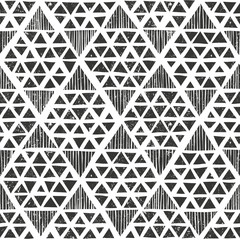 Hand drawn monochrome pattern. Primitive geometric background in grunge style.