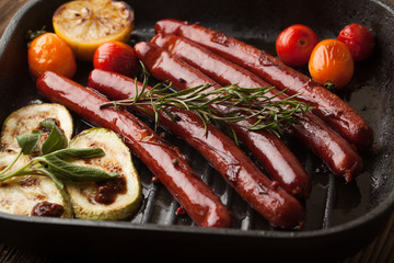 Grilled sausages with vegetables