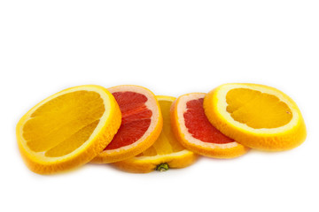 cutting grapefruit and orange