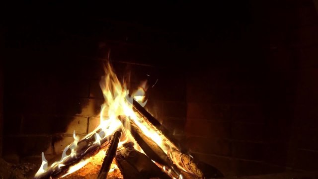 burning fire in the fireplace
