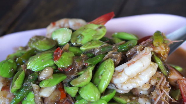 Thai traditional food shrimp fries with parkia. Healthy smelly herb for Thai cuisine