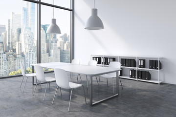 A conference room in a modern panoramic office in New York. White table, white chairs, two white...