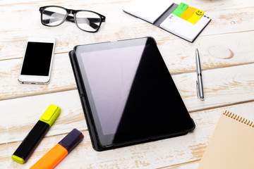 Opened notebook and other office equipment