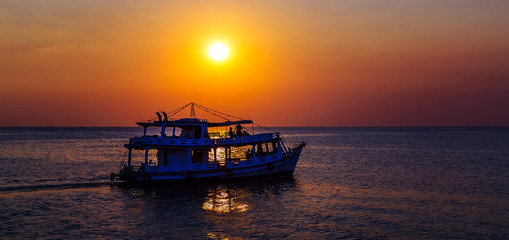 boat in sunrise summer