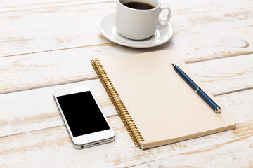 Opened notebook and other office equipment