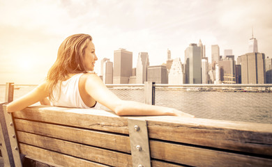 Beautiful woman enjoys the New york skyline view