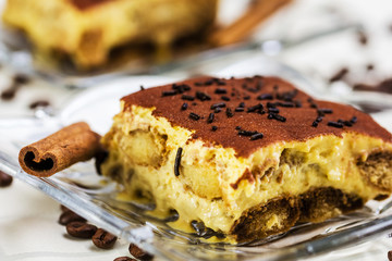 Tiramisu Cake with coffee beans and cinnamon