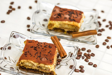 Tiramisu Cake with coffee beans and cinnamon