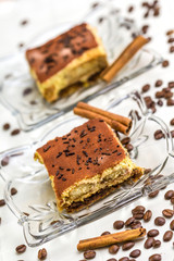 Tiramisu Cake with coffee beans and cinnamon