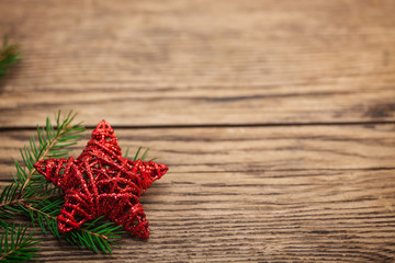 Close up of beautiful christmas decoration, golden and red baubles on bokeh background