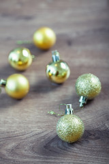 Close up of beautiful christmas decoration, golden and red baubles on bokeh background