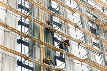 Fototapeta premium Building construction with scaffolding 