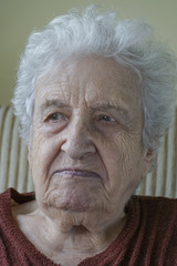 wrinkled face of senior woman