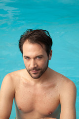 Young man relaxed in pool