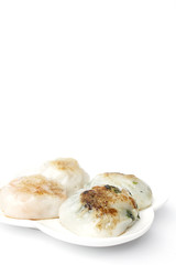 steamed chives dumplings isolated on white background (can stuffed with garlic chives or taro or yam bean mixed with small shrimp)