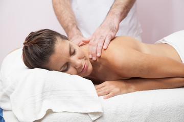 Fototapeta na wymiar Young woman gets a special massage 