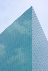 Fototapeta na wymiar The glass surface of Modern office building