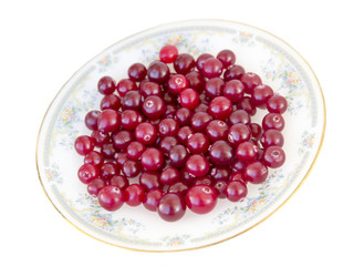Ripe cranberries on a plate