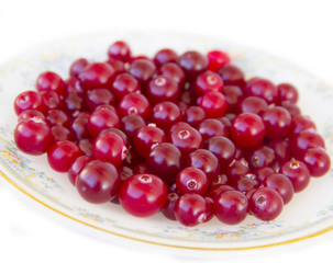 Ripe cranberries on a plate