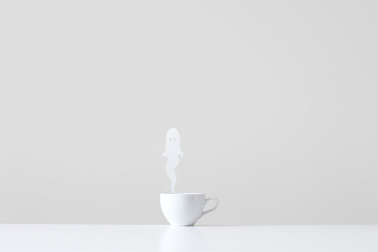 Conceptual cup with ghost steam