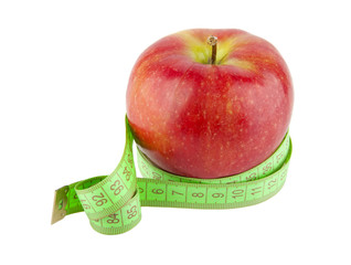 Measuring tape and apple