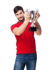 Fototapeta na wymiar man celebrating with trophy