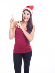 Fototapeta na wymiar Happy christmas woman pointing