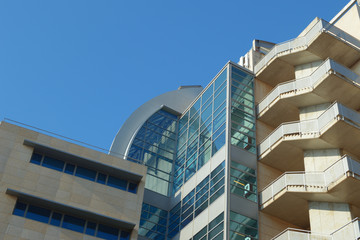 Modern office building with some architectural styles mixed. Empty copy space for editor's text.