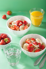 healthy breakfast quinoa with strawberry banana coconut flakes