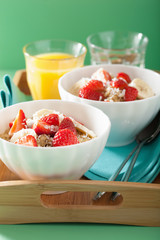 healthy breakfast quinoa with strawberry banana coconut flakes