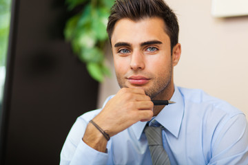 Young businessman at his desk